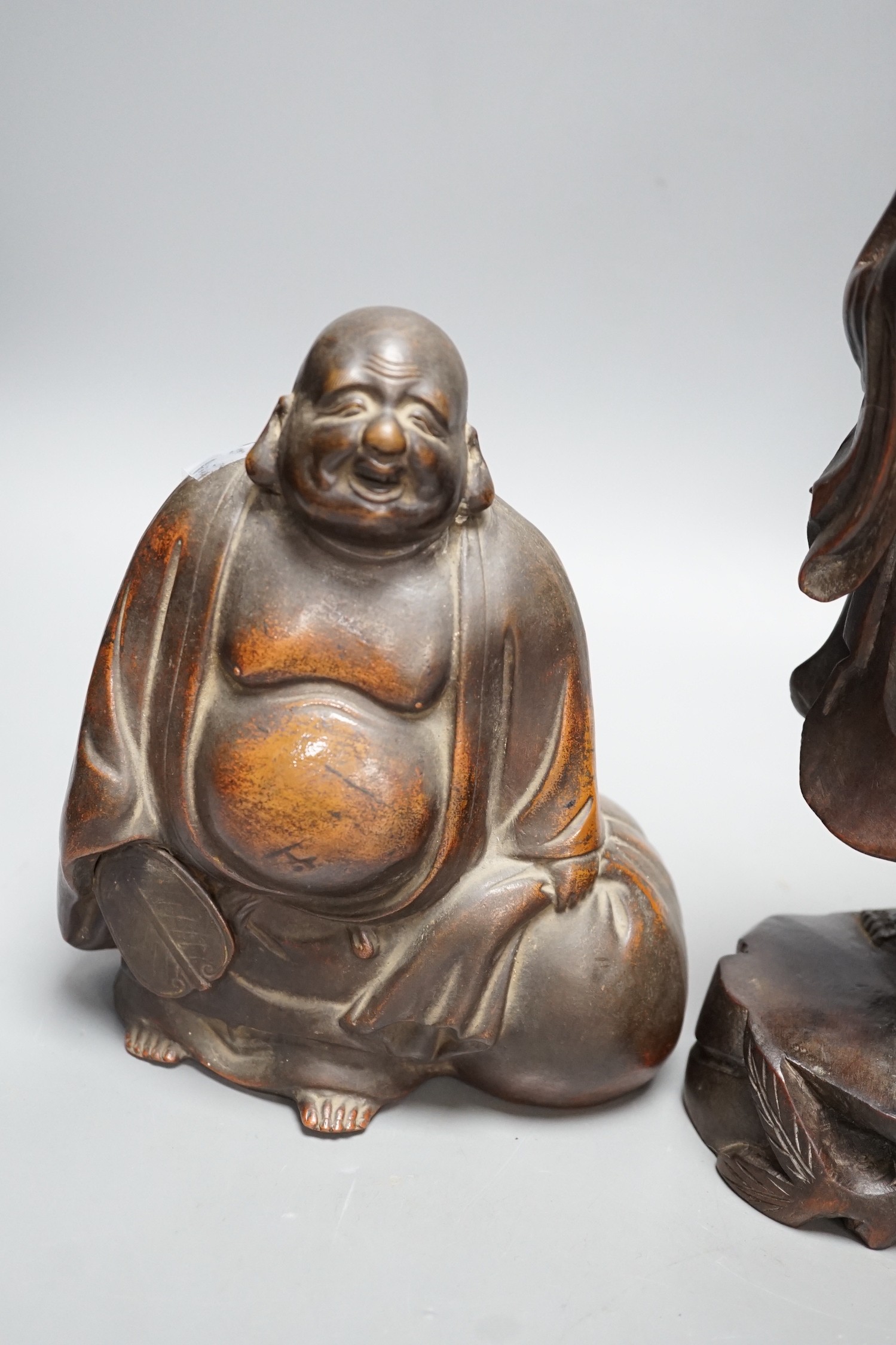 Two Chinese wooden figures and a Bizen pottery figure